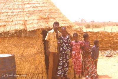 A family in front of their house at Sadore, Niger