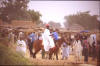 Horse: photo of man on horse back near market